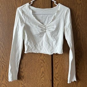 Lettuce Edge Ruched Bust Solid Long Sleeve Top